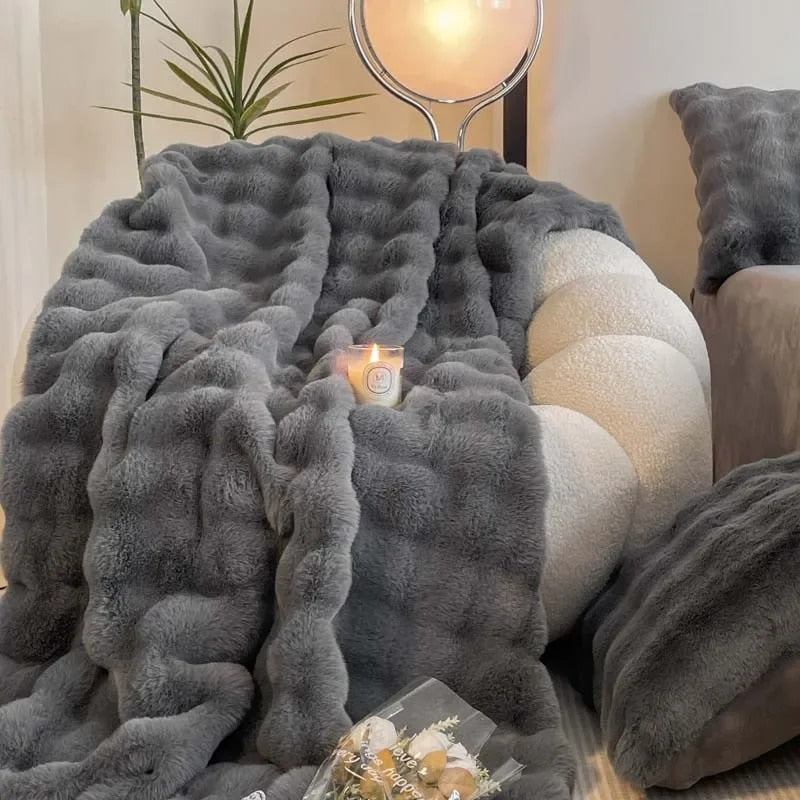https://cdn.shopify.com/s/files/1/0783/2947/9517/files/Super-Soft-Fluffy-Luxury-Rabbit-Faux-Fur-Wave-Throw-4-Colours-Lilly-Lula-8734.jpg?v=1726131562